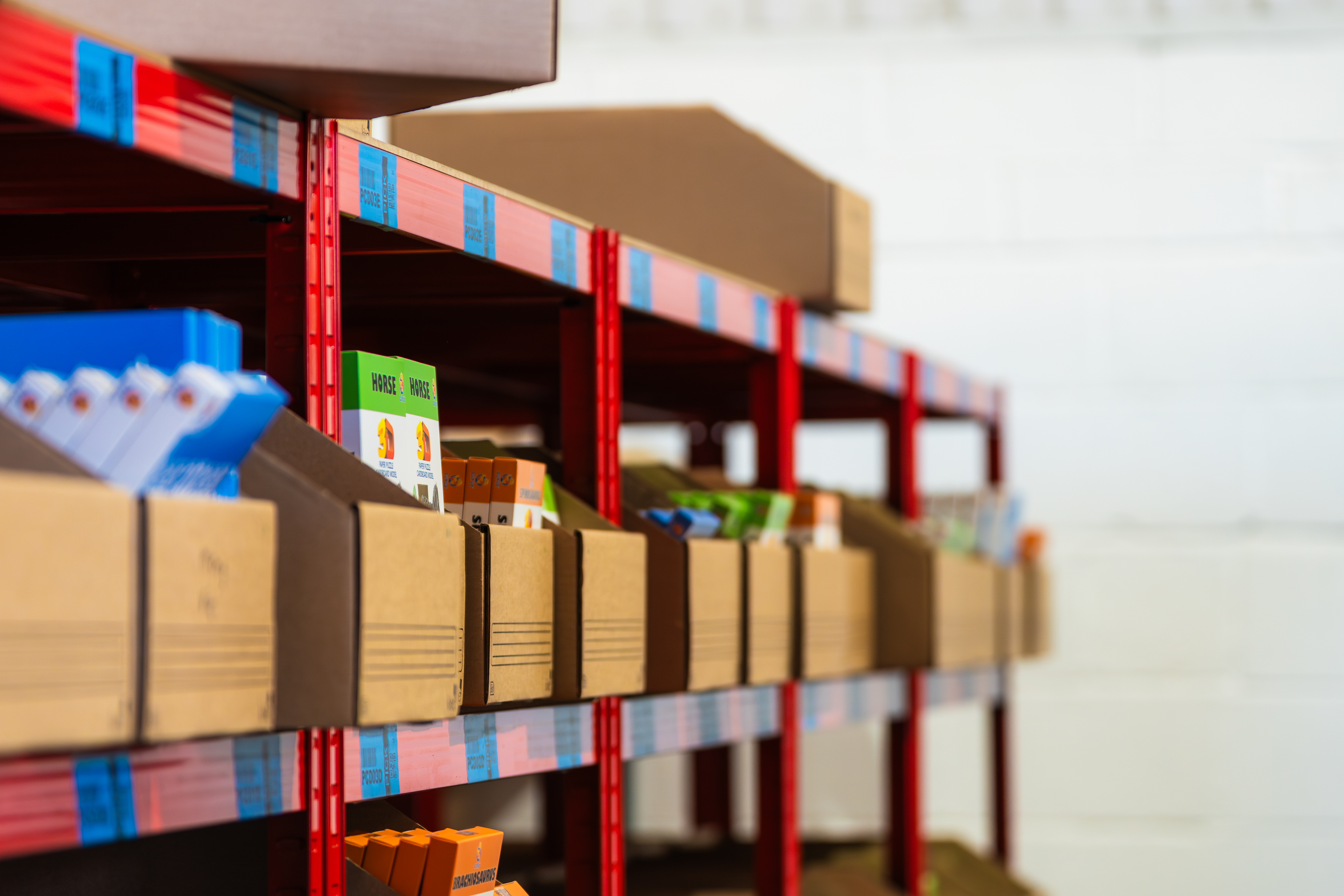 Go On Make Me and Happy Puzzle Company stock at Reilly's toys and games fulfilment warehouse